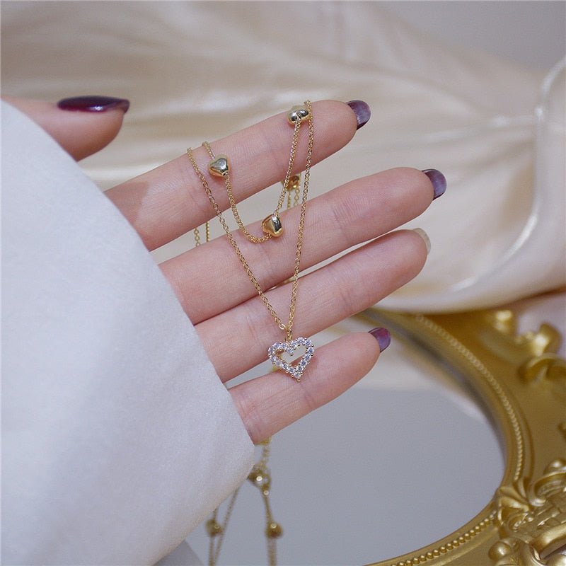 Colar Duplo Dourado com Coração Cravejado de Zircônias