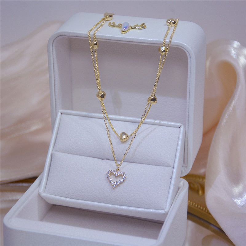 Colar Duplo Dourado com Coração Cravejado de Zircônias